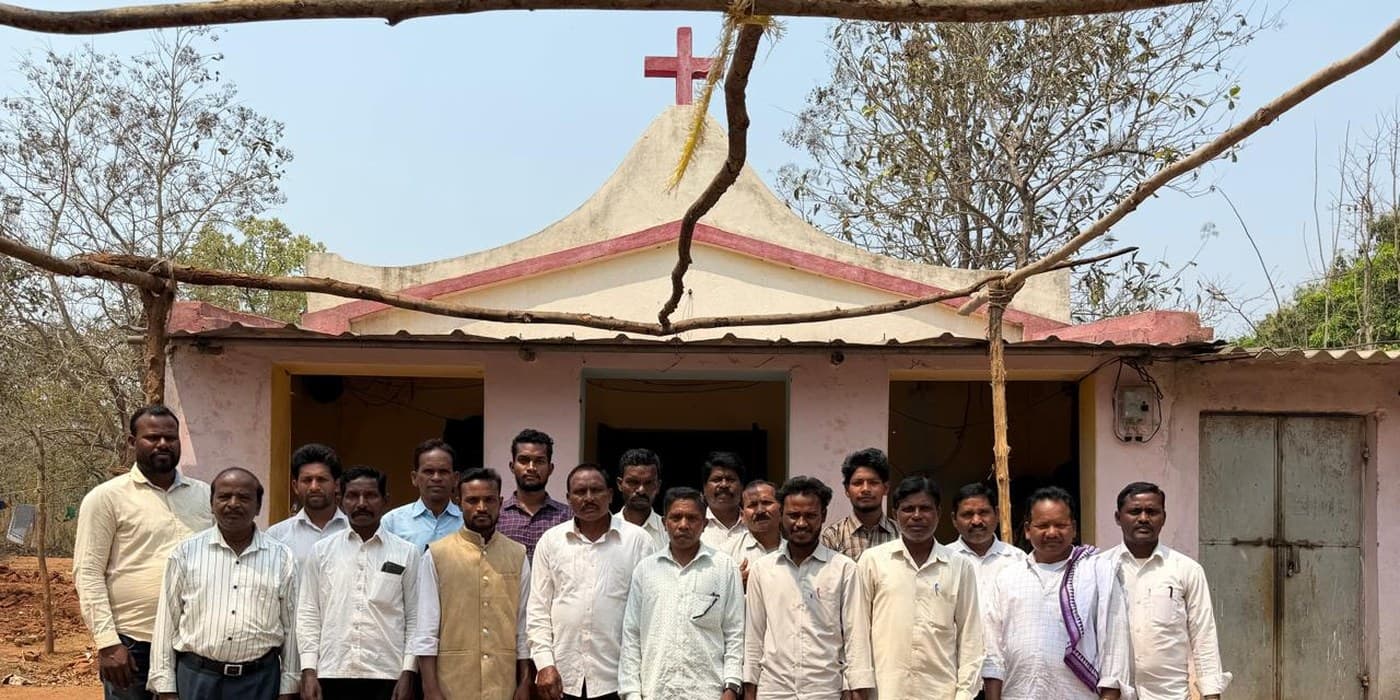 MERCE Charitable Trust full team gathered outside a village church after a community outreach programme