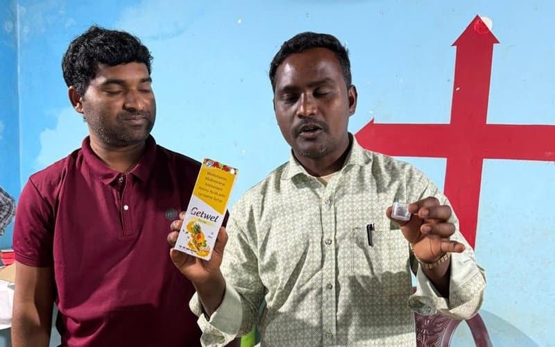 MCT leaders explaining nutrition and health supplements to community members