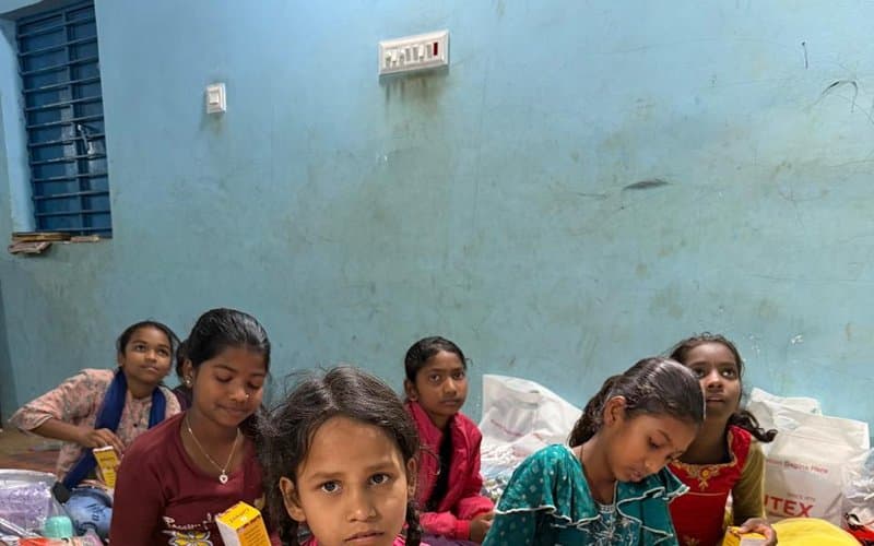 Girls receiving nutrition supplements distributed by MERCE Charitable Trust